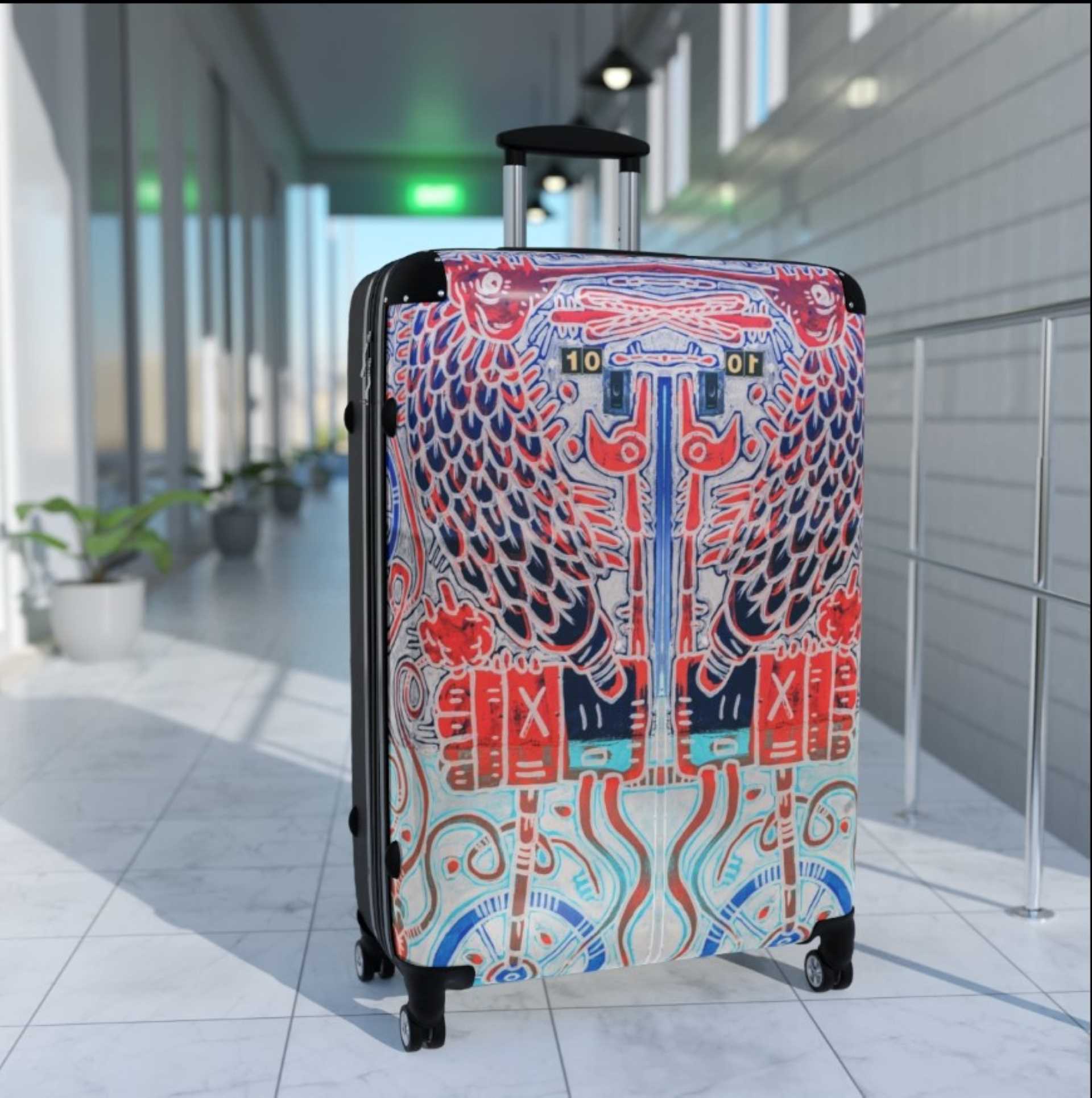 A Meso-American culture inspired hard shell suitcase with wheels.
