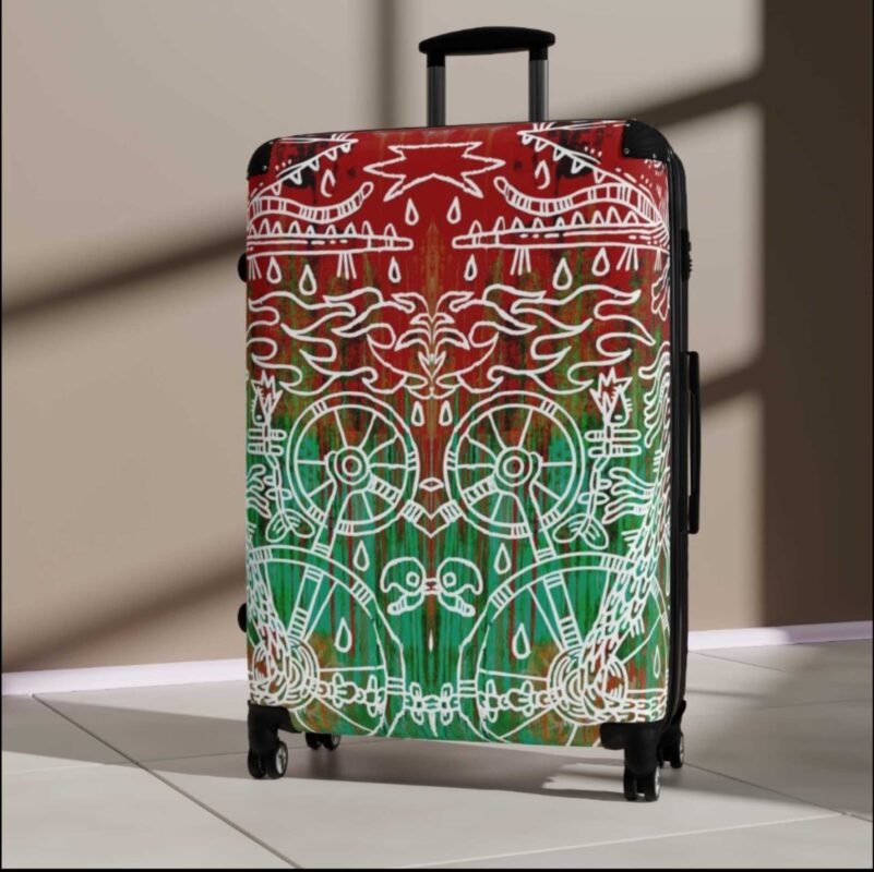 A close up image of a hard-shell patterned suitcase.